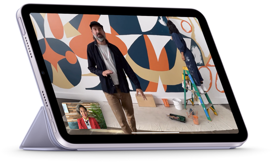 iPad mini shown in landscape view attached to Smart Folio in a viewing position. The display is showing a FaceTime call with Centre Stage